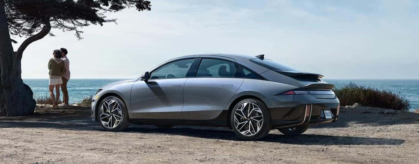 A silver 2023 Hyundai IONIQ 6 near a coast.