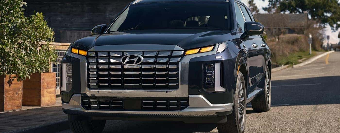 Black 2025 Hyundai Palisade for sale near Orlando parked on the side of a street