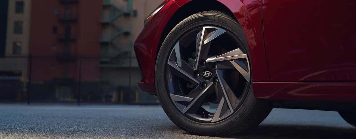 Front wheel of a red 2024 Hyundai Elantra