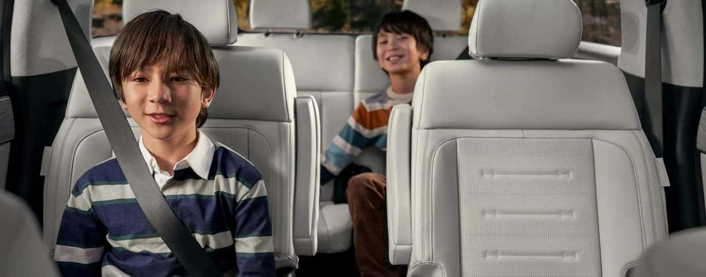 Kids in the rear seating of a 2025 Hyundai Santa Fe Hybrid