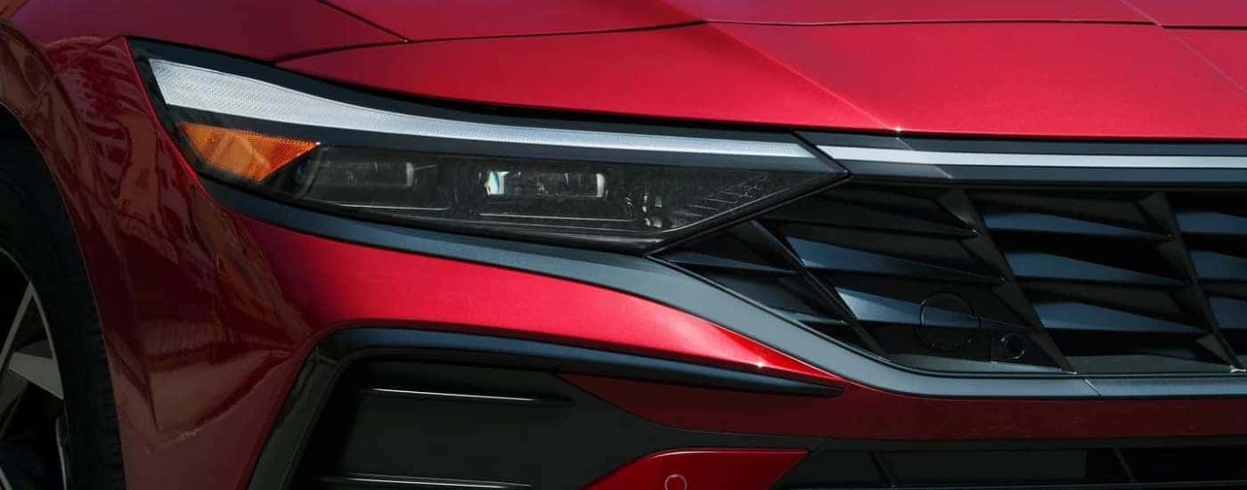 Passenger side headlight on a red 2024 Hyundai Elantra Limited