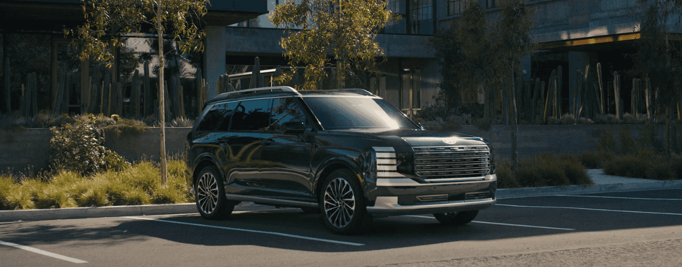 Green 2027 Hyundai Palisade backed into a parking spot