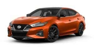 An orange 2021 Nissan Maxima angled left