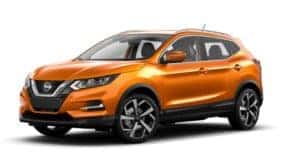 An orange 2021 Nissan Rogue Sport angled left