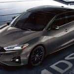 A grey 2021 Nissan Altima is shown parked at an angle.