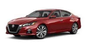 A red 2022 Nissan Altima is angled left.