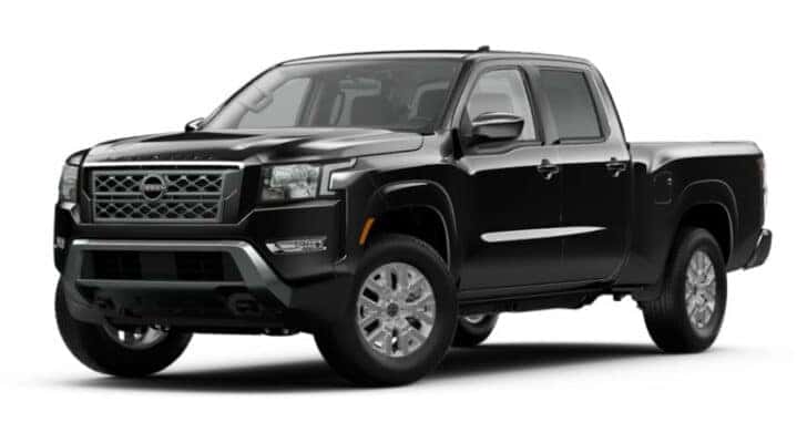 A black 2023 Nissan Frontier SV is angled left.