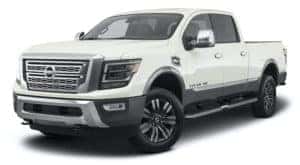 A white 2023 Nissan Titan XD is angled left.