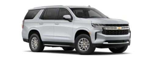 A white 2023 Chevy Tahoe LS is angled right.