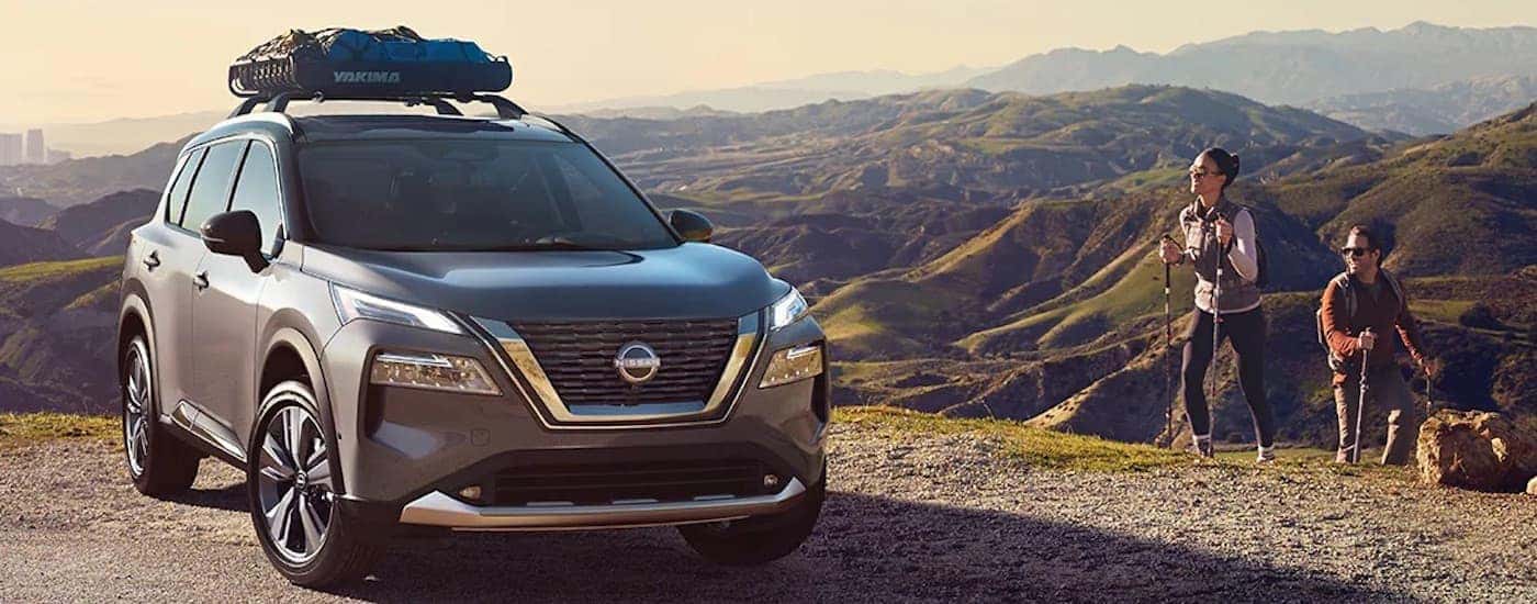 A grey 2022 Nissan Rogue is shown from the front at an angle.