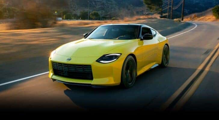A yellow 2021 Nissan Z is shown from the front at an angle after leaving a Decatur (IL) Nissan dealer.