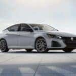 A silver 2024 Nissan Altima SR is shown parked after a 2024 Nissan Altima vs 2024 Toyota Camry comparison.