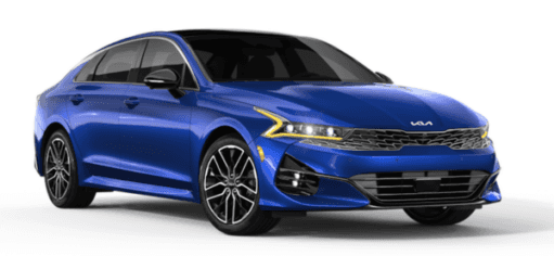 A blue 2024 Kia K5 is angled right.