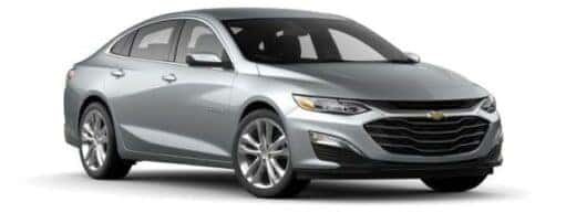 A silver 2024 Chevy Malibu is angled right.
