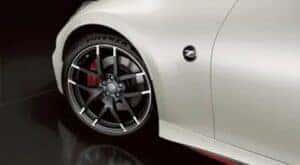 The wheel of a white 2020 Nissan 370z Nismo is shown.