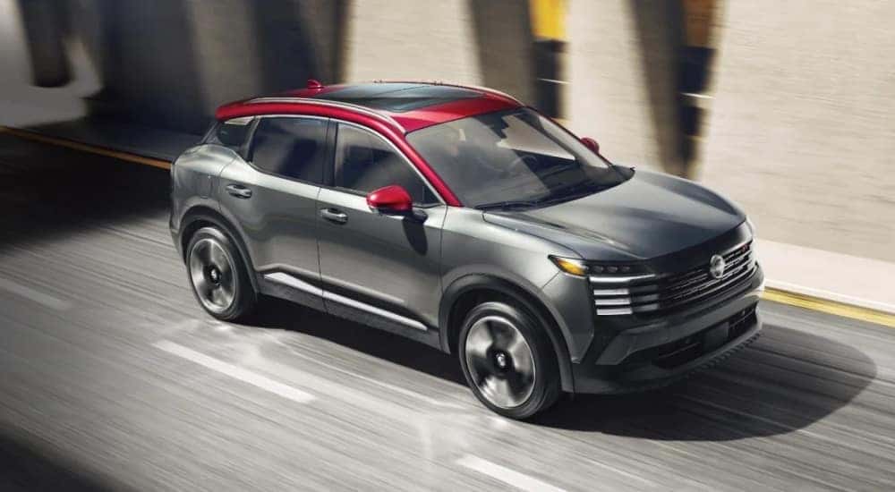 A grey 2025 Nissan Kicks SR is shown from the side.