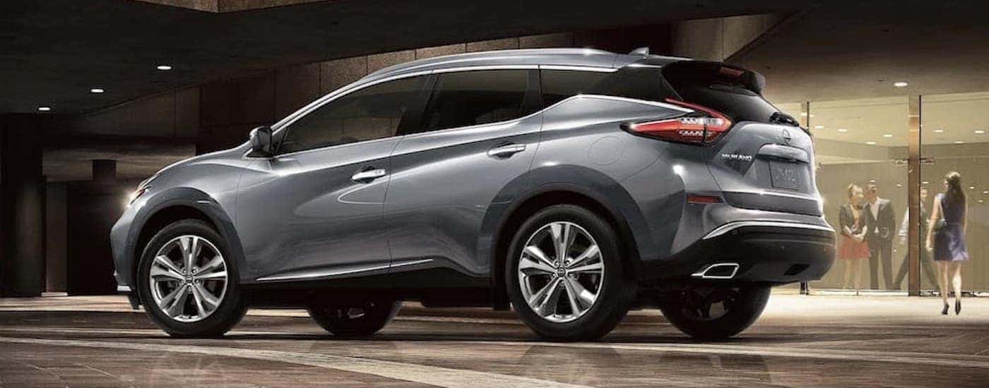 A grey 2023 Nissan Murano for sale is shown from the side.