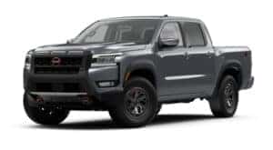 A grey 2025 NIssan Frontier PRO-X is angled left.