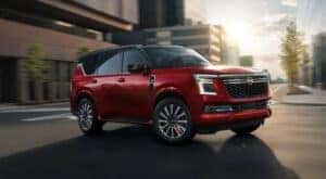 A red 2025 Nissan Armada is shown from the front at an angle.