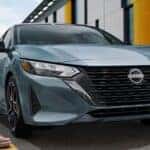 Close-up on the front of a blue 2025 Nissan Sentra SR.