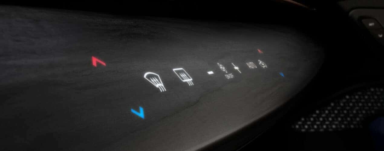 A close-up shows touch controls in a 2025 Nissan ARIYA.