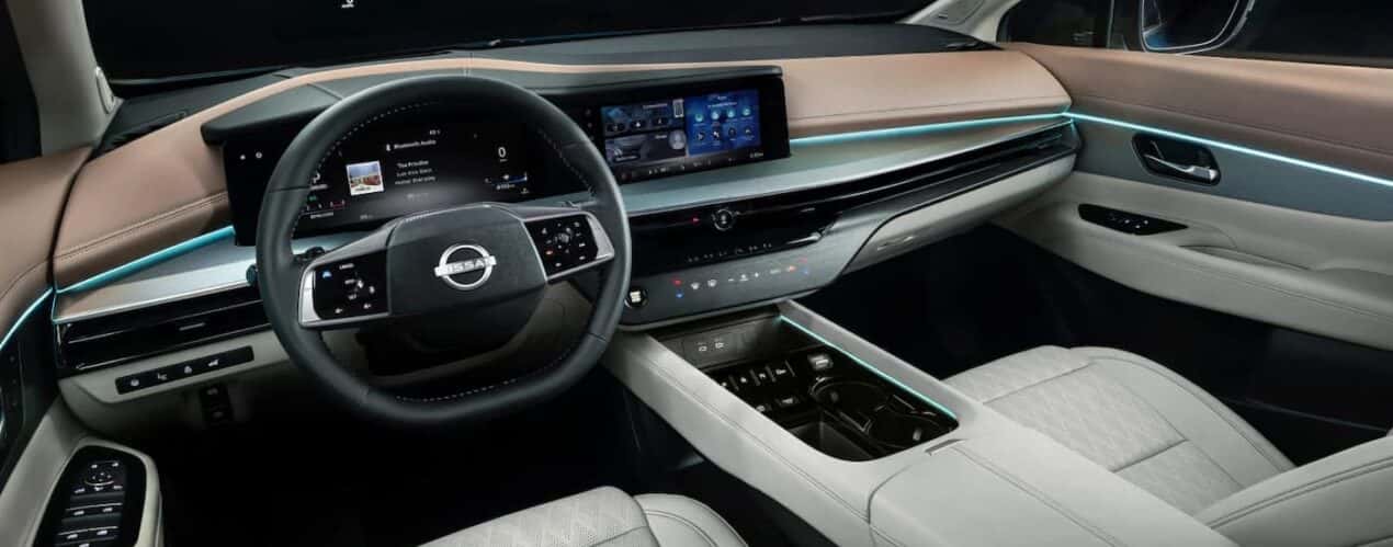 The white and gray interior and dash are shown in a 2025 Nissan Murano Platinum.