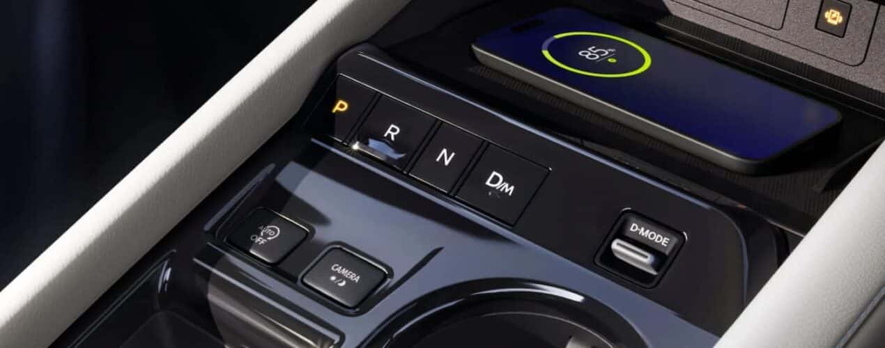 A close-up of push button transmission shifter is shown in a 2025 Nissan Murano Platinum.
