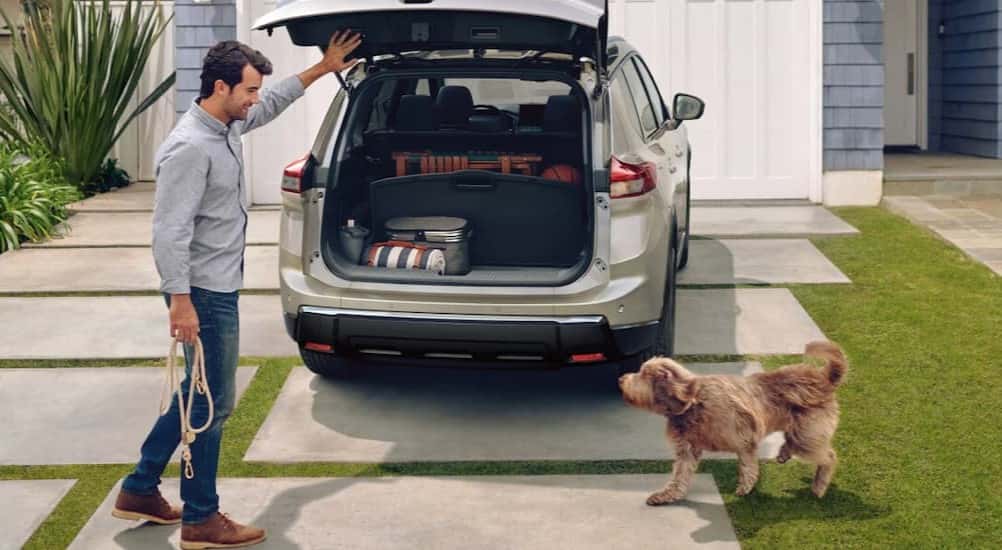 An open tailgate on a parked 2025 Nissan Rogue.