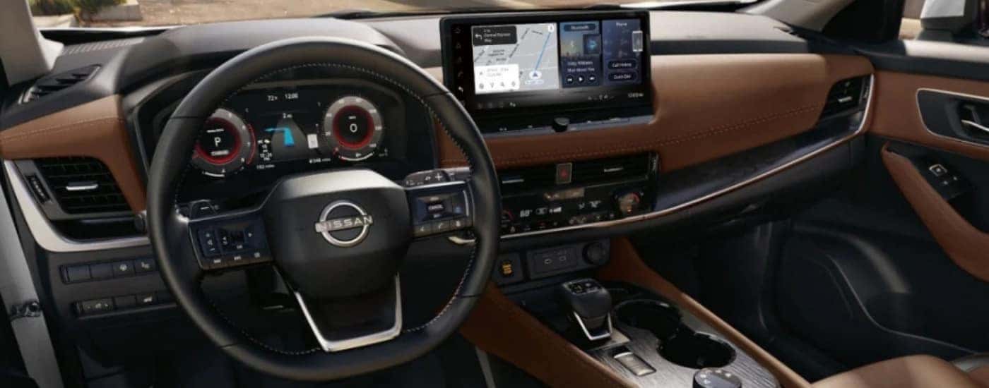 The brown interior of a 2025 Nissan Rogue.