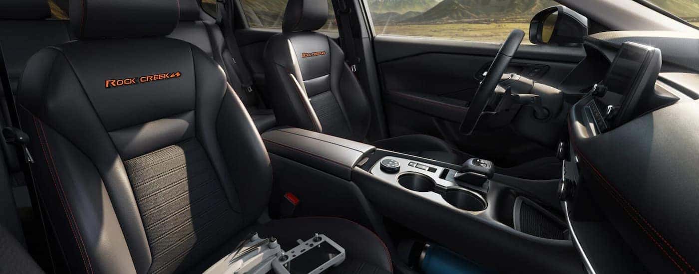 Black interior of a 2025 Nissan Rogue Rock Creek.
