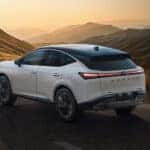A white 2025 Nissan Murano from the rear at an angle.