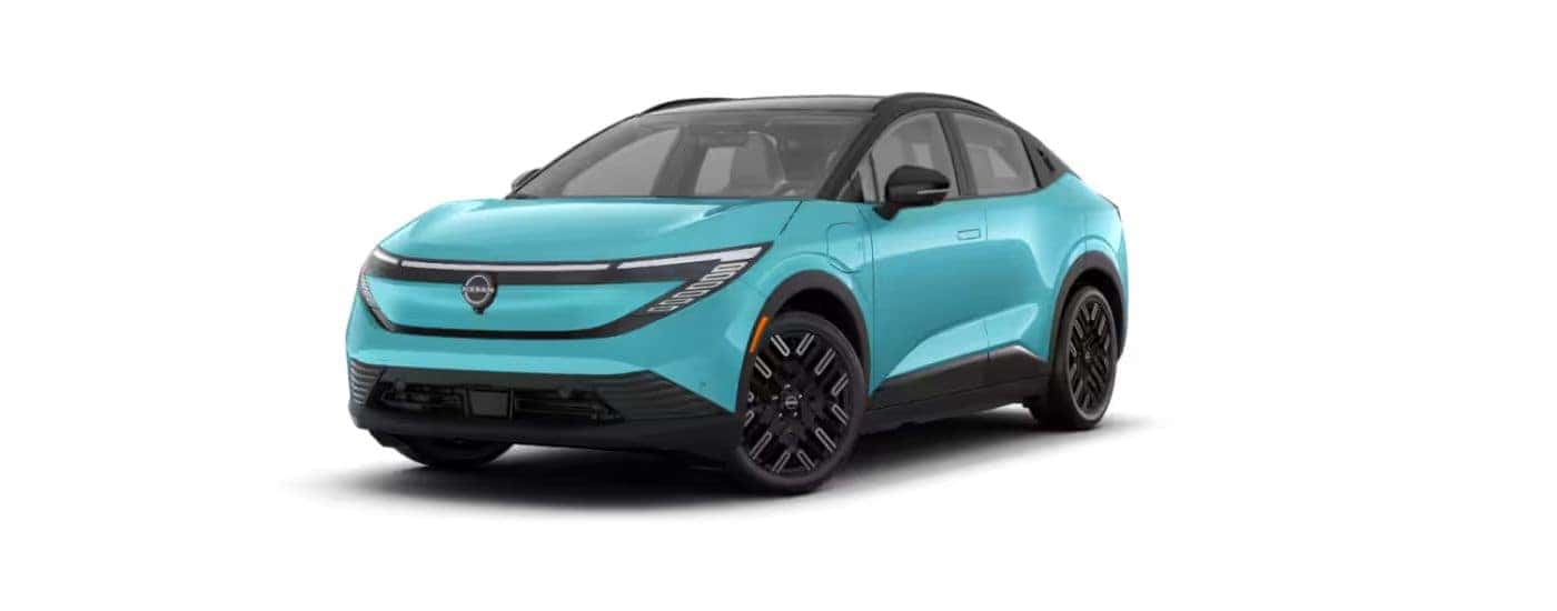 An aqua 2026 Nissan LEAF angled left.