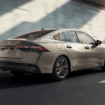Bronze 2026 Nissan Sentra driving on a highway