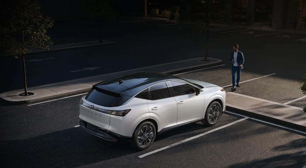 A white 2026 Nissan Murano parked in a parking lot.