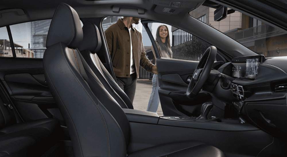 A couple gets into their 2026 Nissan Senta