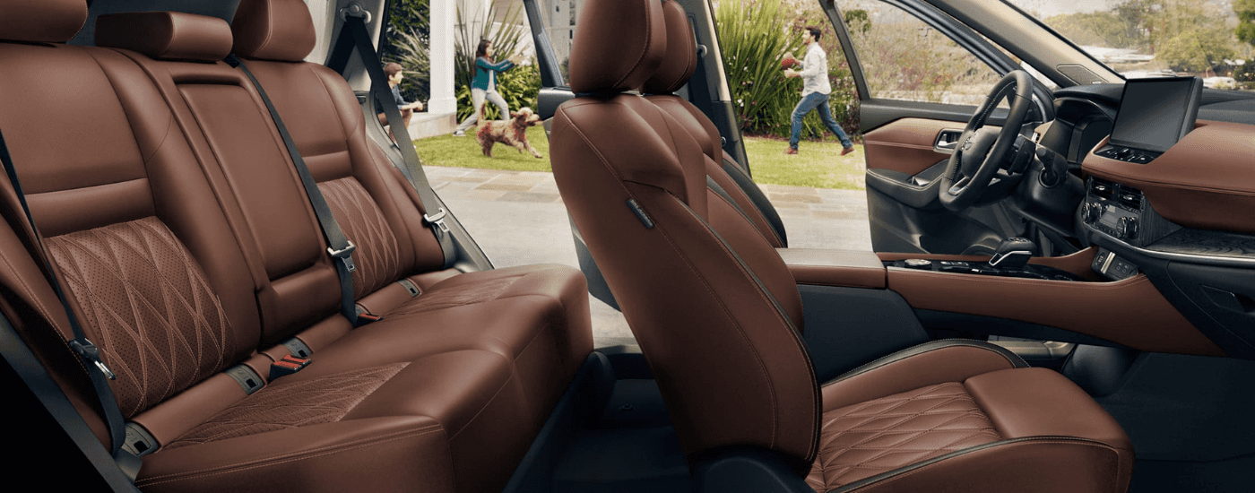 Brown leather quilted interior of a 2026 Nissan Rogue