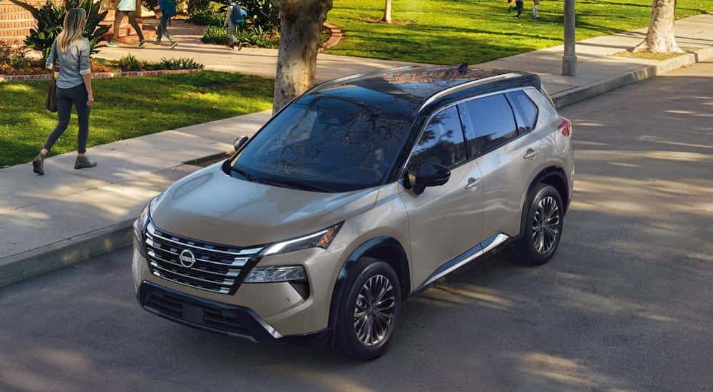 Grey 2026 Nissan Rogue parked near a curb.