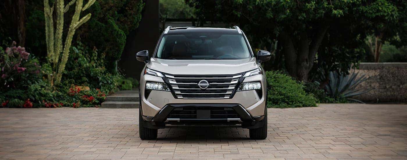 Silver 2026 Nissan Rogue parked in a driveway