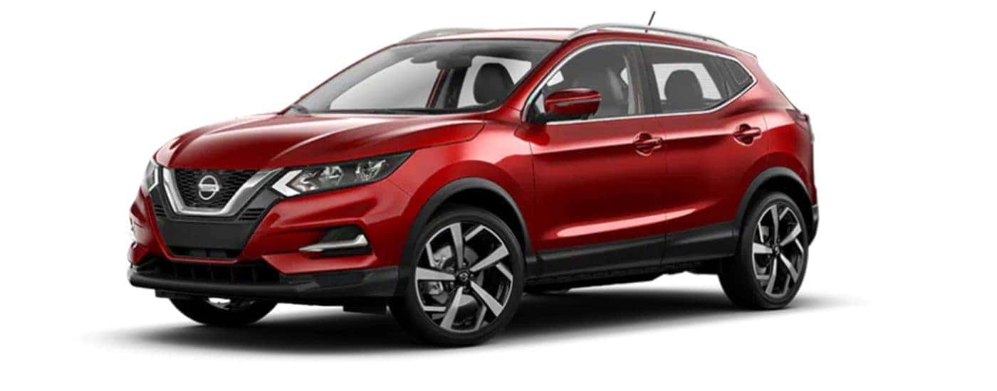 Red 2021 Nissan Rogue Sport angled left.