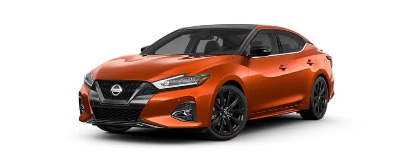Orange 2021 Nissan Maxima angled left.