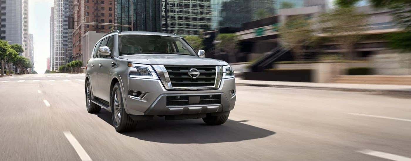 Grey 2023 Nissan Armada driving through the city