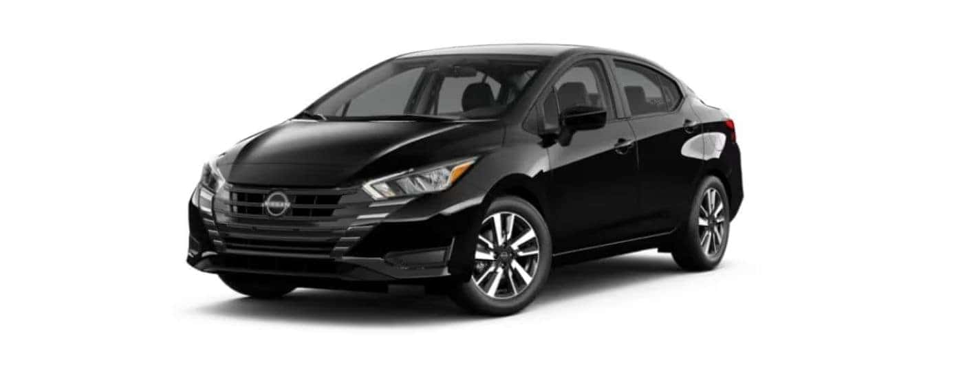 Black 2023 Nissan Versa angled left