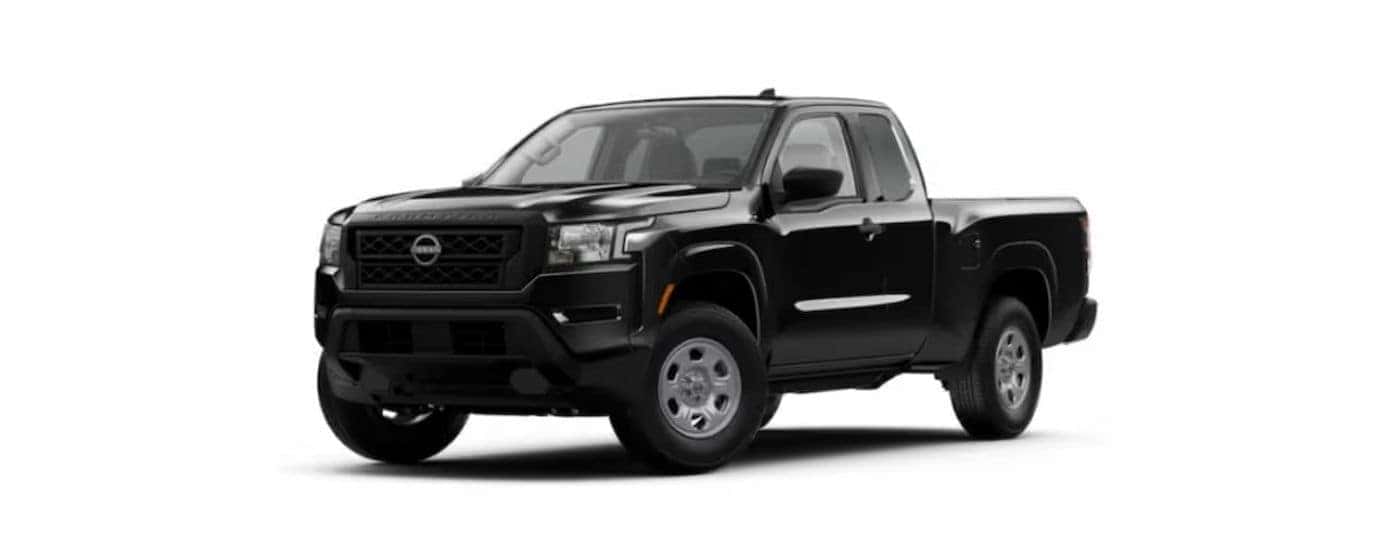 Black 2024 Nissan Frontier angled left