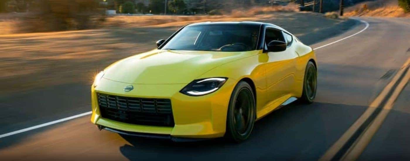 A yellow 2021 Nissan Z is shown from the front at an angle.