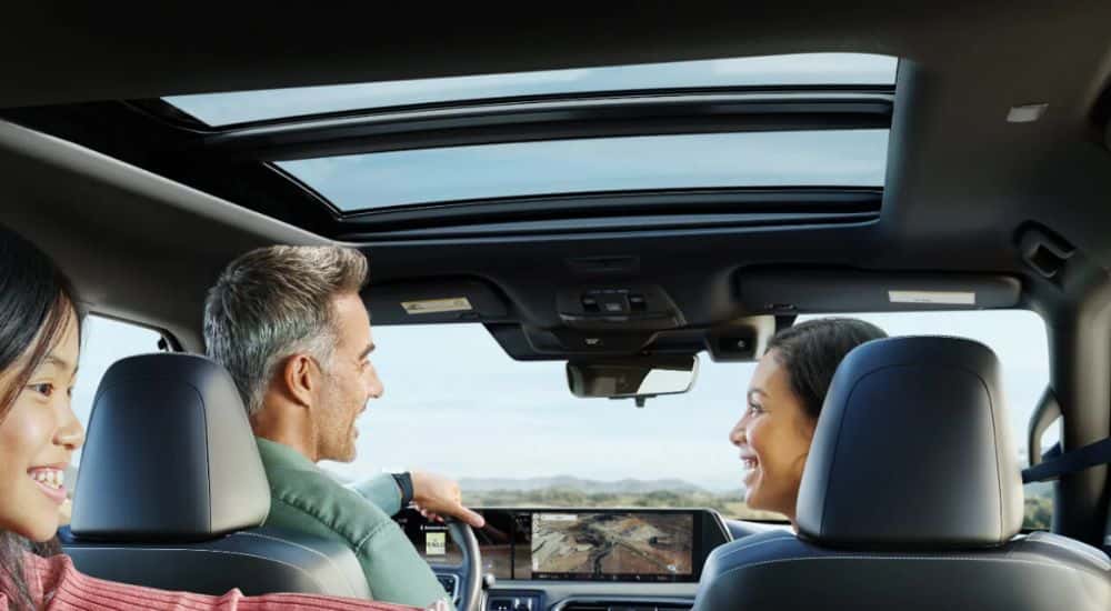 Interior view of a family in their 2026 Nissan Armada PRO-4X.