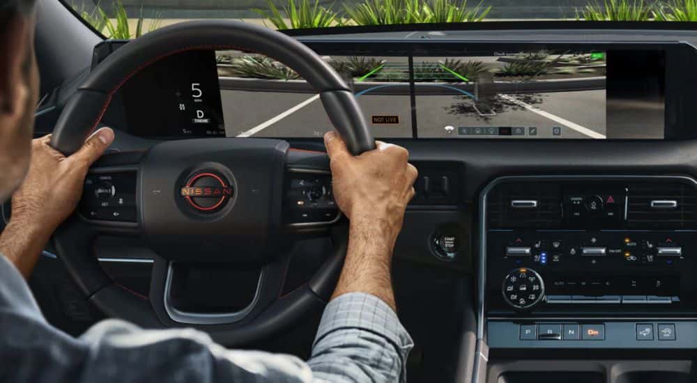 Interior view of a person using the 2026 Nissan Armada PRO-4X invisible hood view.