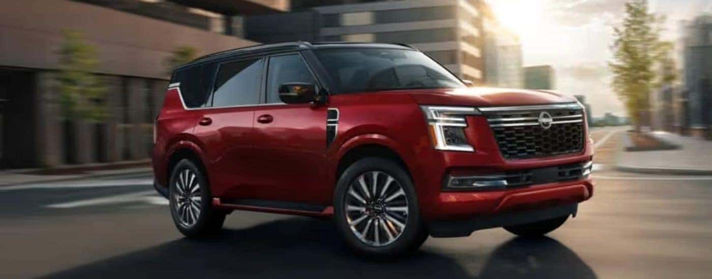Red 2025 Nissan Armada shown from front at an angle. 