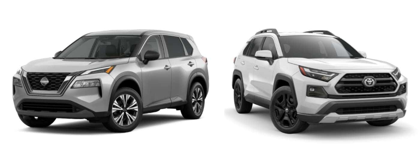 Silver 2022 Nissan Rogue angled left and white 2022 Toyota RAV4 angled right