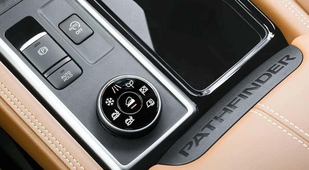 Close-up of a drive mode dial in a 2026 Nissan Pathfinder.