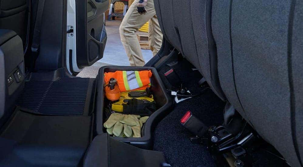Rear under-seat storage in a 2026 Nissan Frontier.